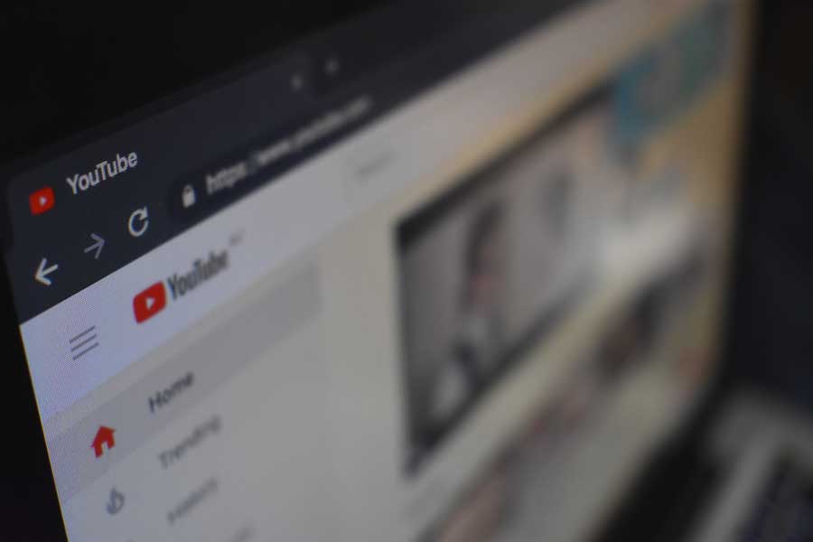 close up shot of laptop with Youtube in focus on corner for Safe Play by Relay